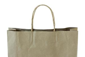 close up brown paper bag isolated on white photo