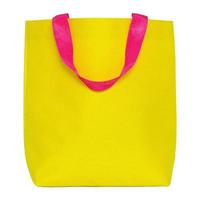 yellow shopping bag isolated on white photo