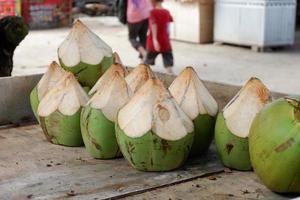 Fresh and healthy green coconut ready to drink photo