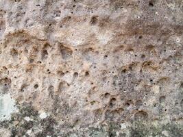 The texture of stone used for background images, Surface of stone brown color photo