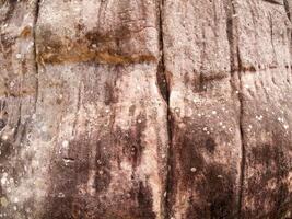 The texture of stone used for background images, Surface of stone brown color photo