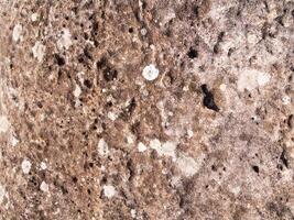 The texture of stone used for background images, Surface of stone brown color photo