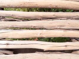 Timber wall in the ground On a natural background photo