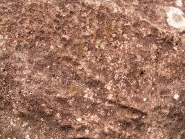 The texture of stone used for background images, Surface of stone brown color photo