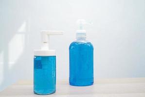 Two bottle of hand alcohol sanitizer gel for prevent the spread of pandemic Covid-19 and Coronavirus, hygiene and health care concept photo
