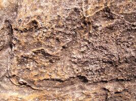 The texture of stone used for background images, Surface of stone brown color photo