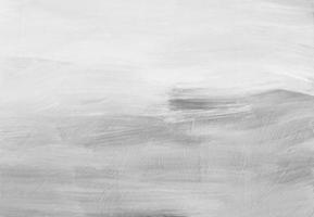Abstract white background. Light monochrome backdrop. Gray and white backdrop. Minimalist painting. Brush strokes on paper. photo
