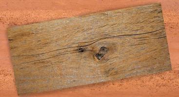 wooden plank on dirt photo