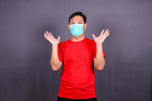 Man wearing hygienic mask to prevent infection, airborne respiratory illness such as flu, 2019-nCoV. Isolated on white background photo