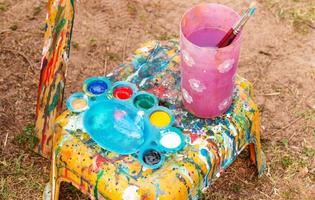 painting tools on stool photo