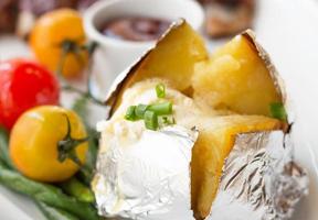 baked potato with butter photo