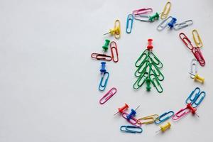 New Year Christmas decorations on white background stationery items photo