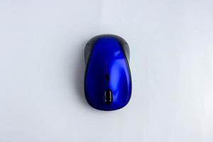 blue computer mouse isolated on white background photo