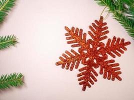 Red snowflake. Decorations for the holiday. photo