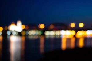 Blurred night lights. background, light spots, flashes, lights, city lights, night city, light bulbs defocus blur photo