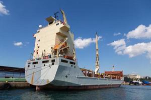 Cargo Ship in port photo