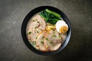 Ramen noodles in pork bone soup with roast pork and egg photo