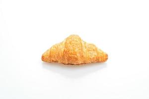 croissant fresco sobre fondo blanco foto