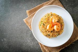 fried shrimps fried rice on plate photo