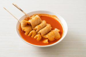 Odeng - Korean fish cake skewer in Korean spicy soup photo