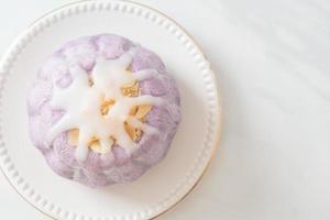 taro bun with white sugar cream and nut photo