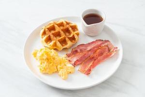 scrambled egg with bacon and waffle photo