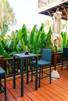 empty outdoor patio deck and chair photo