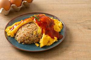 Flavored Fried Rice in an Omelet Wrapping photo