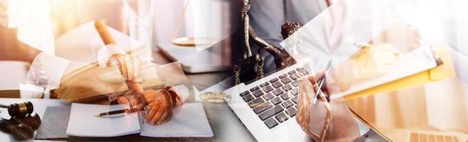 Business and lawyers discussing contract papers with brass scale on desk in office. Law, legal services, advice, justice and law concept picture with film grain effect photo