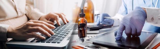 Medicine doctor hand working on a patients x-ray scans digital healthcare and connection with modern virtual screen interface icons, Medical technology and network concept. photo