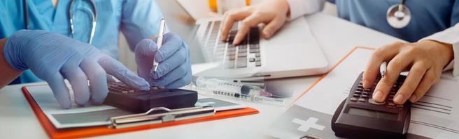 Medicine doctor hand working on a patients x-ray scans digital healthcare and connection with modern virtual screen interface icons, Medical technology and network concept. photo