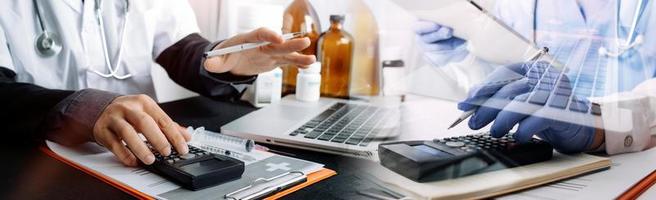 Medicine doctor hand working on a patients x-ray scans digital healthcare and connection with modern virtual screen interface icons, Medical technology and network concept. photo
