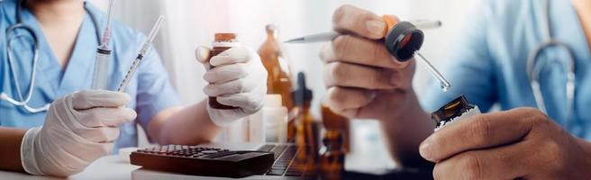 Medicine doctor hand working on a patients x-ray scans digital healthcare and connection with modern virtual screen interface icons, Medical technology and network concept. photo