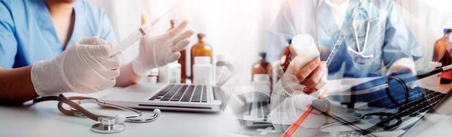 Medicine doctor hand working on a patients x-ray scans digital healthcare and connection with modern virtual screen interface icons, Medical technology and network concept. photo