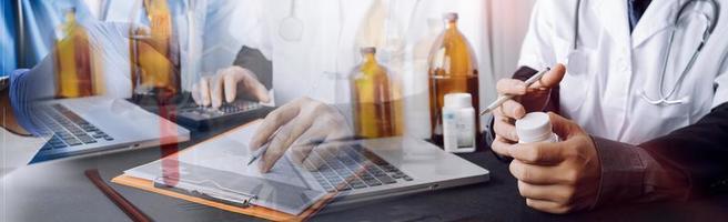 Medicine doctor hand working on a patients x-ray scans digital healthcare and connection with modern virtual screen interface icons, Medical technology and network concept. photo
