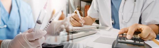 Medicine doctor hand working on a patients x-ray scans digital healthcare and connection with modern virtual screen interface icons, Medical technology and network concept. photo