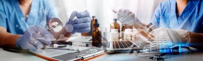 Medicine doctor hand working on a patients x-ray scans digital healthcare and connection with modern virtual screen interface icons, Medical technology and network concept. photo