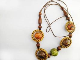 Depok, West Java, Indonesia, 2022 - Women necklace. Collection of fashionable necklaces made of wood, beads isolated on a white background. Beauty, jewelry, accessory.