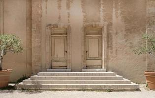 Steps leading to two doors of an old building in Marseille photo