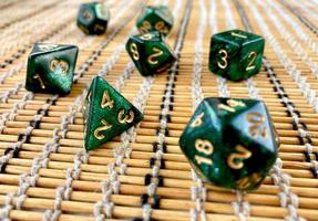 Dice game green polyhedral, MTG dice and cards. photo