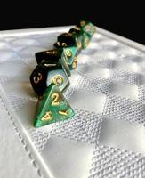Dice game green polyhedral, MTG dice and cards. photo