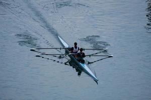 Bilbao, Vizcaya, Spain, 2022 - athletes training in a canoe on the Nervion River in Bilbao, basque country, spain photo