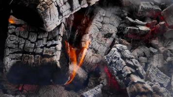 Close up of burning coals with fire Glowing Charcoal Background. BBQ grill embers video