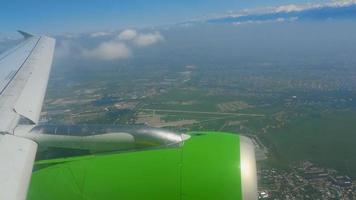 Aerial view, aircraft descending before landing in Almaty airport, Kazakhstan video