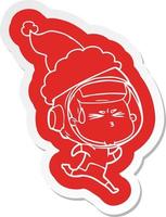 cartoon  sticker of a stressed astronaut wearing santa hat vector