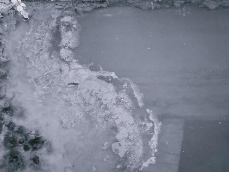 overflow water pipe. Stone wall background. photo