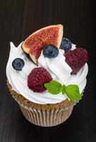 Cupcakes with berries photo