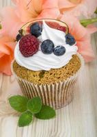 Cupcakes with berries photo
