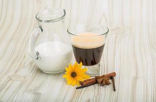 Espresso on wooden background photo