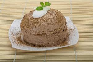 Homemade cake on the plate and wooden background photo